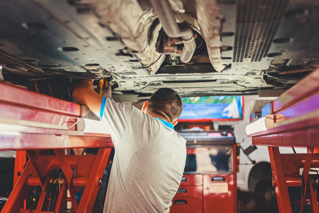 Mobile mechanic working under a vehicle